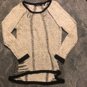 Worn black and white guess sweater